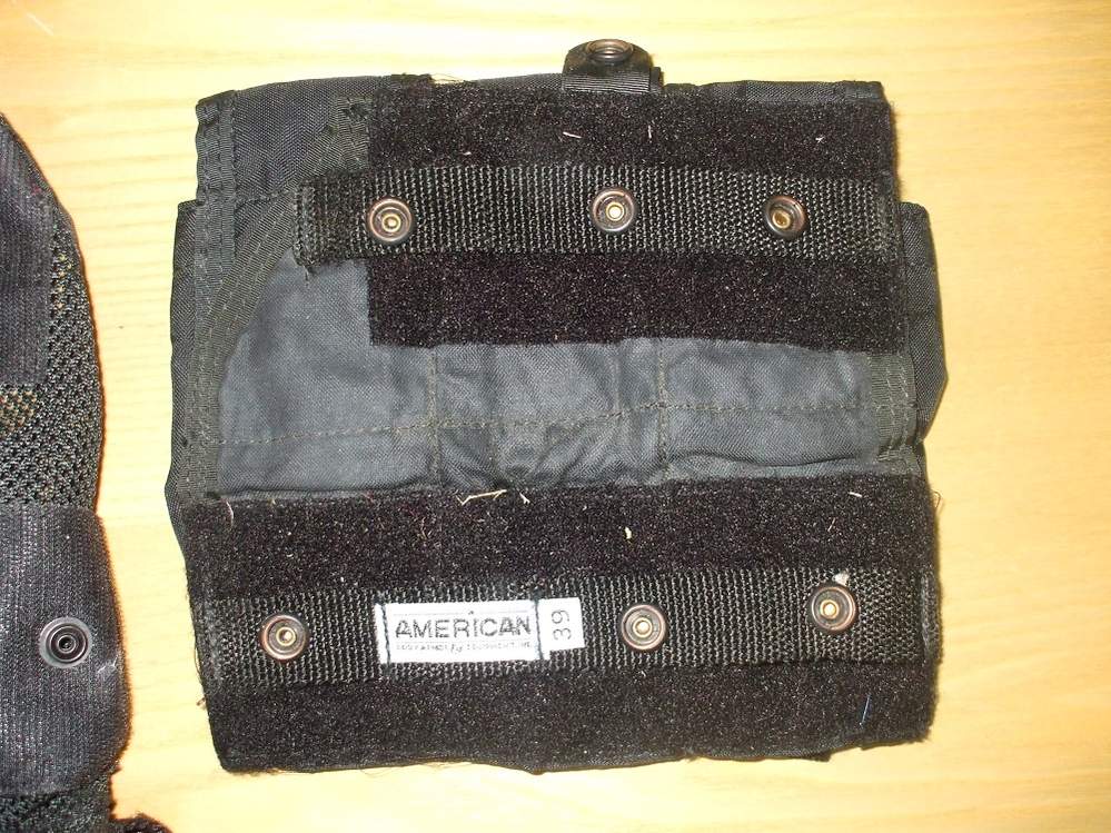 piastra portacaricatori staccata: il sistema di aggancio posteriore